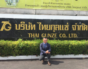 Mr Tadashi and Gunze sign