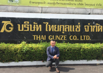 Mr Tadashi and Gunze sign