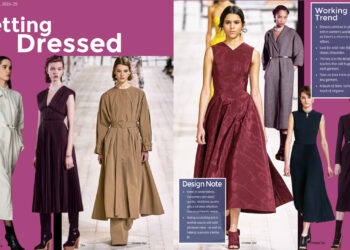 A fashion magazine with a picture of a woman in a dress.